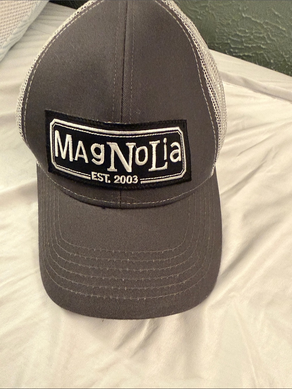 Cap on Bed - Not Home Accent